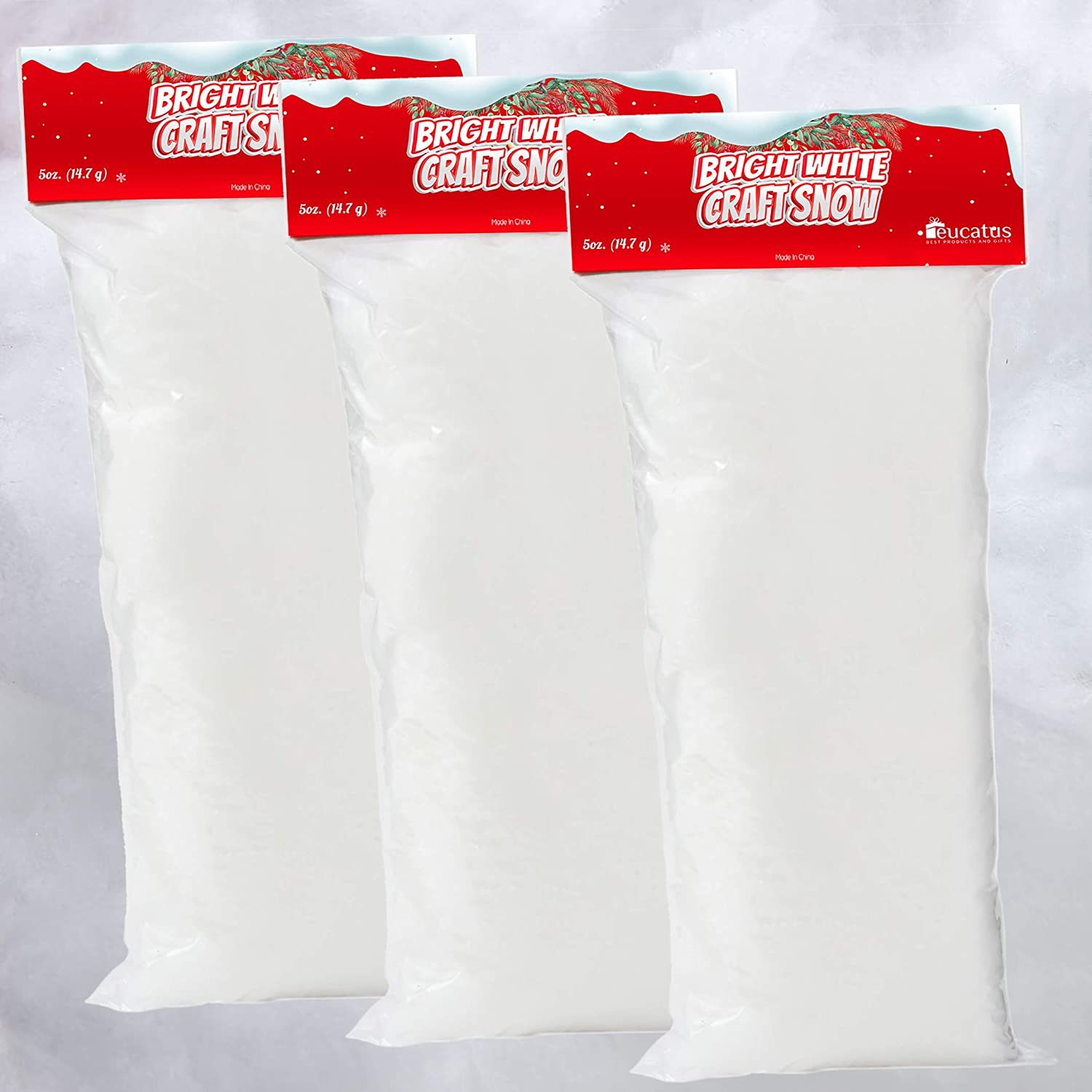 Eucatus original main image: three plain bags of craft snow on a white background